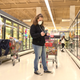 Clark resident Jen Valencia, center, shops for a customer as she supplements her income working for Instacart at Acme Market on April 27, 2020 in Clark, New Jersey.